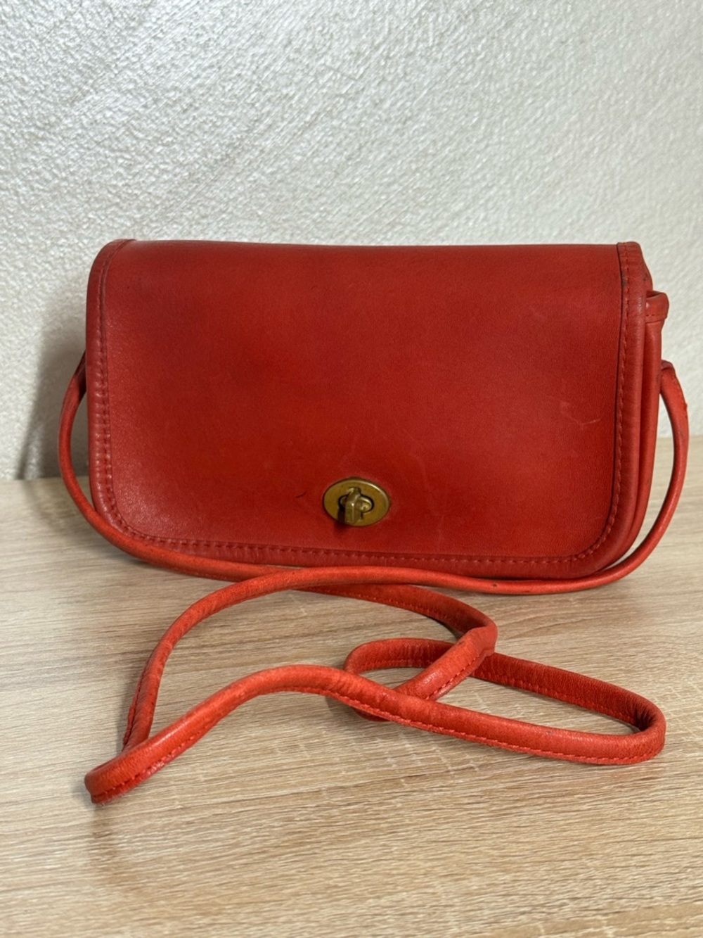 Vintage Coach Dinky crossbody bag in a striking red leather rare